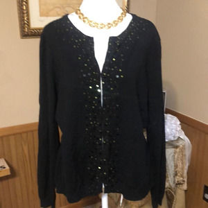 Black shiny sweater by Index size medium. Stretch and it has eyelets for snaps